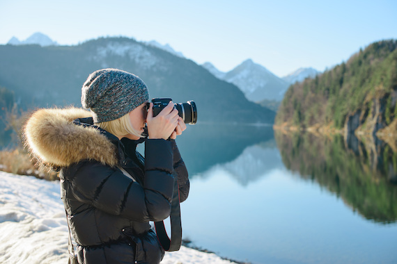 Person capturing outdoor photos