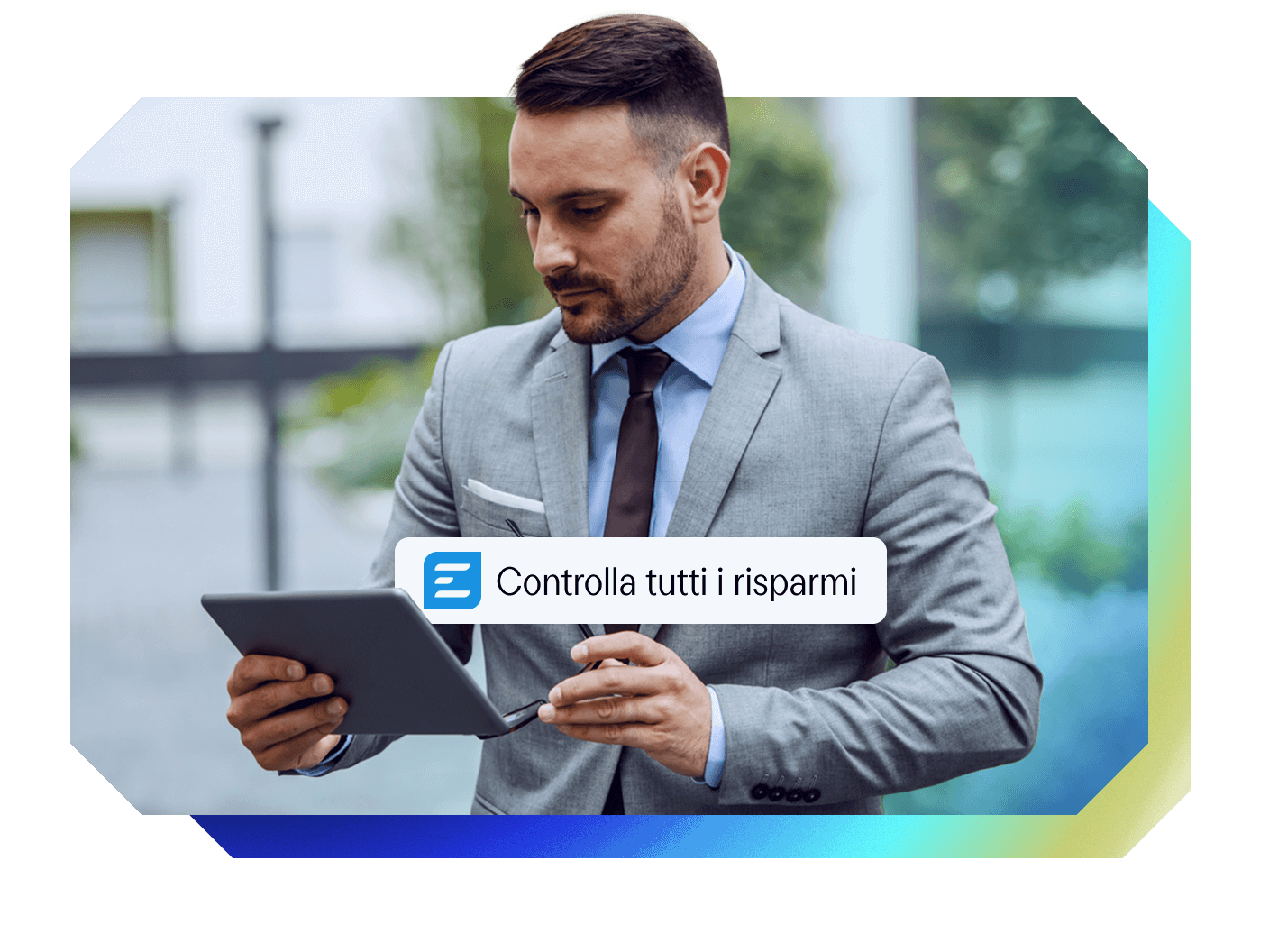 Businessman looking at a tablet displaying a pop-up with "Controlla tutti i risparmi" (Check all savings).