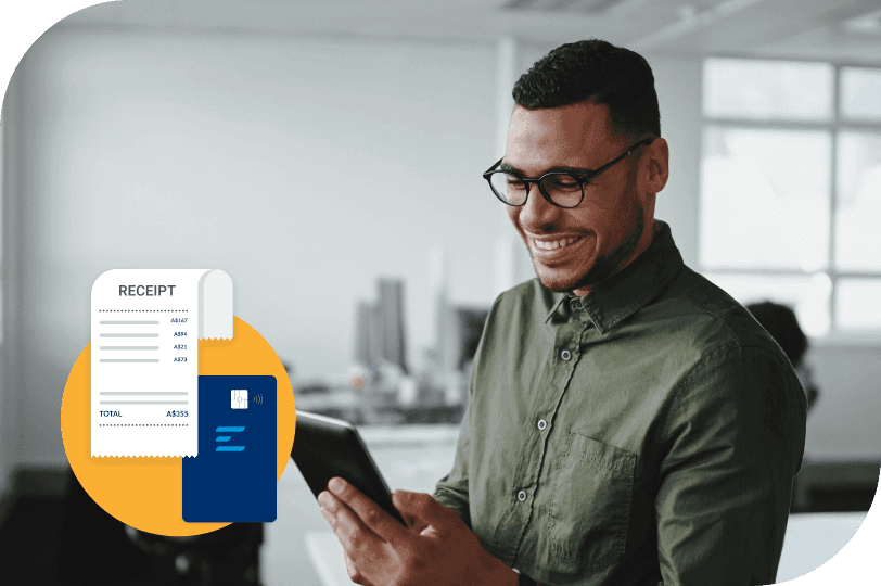 a man is smiling while looking at a receipt on his phone