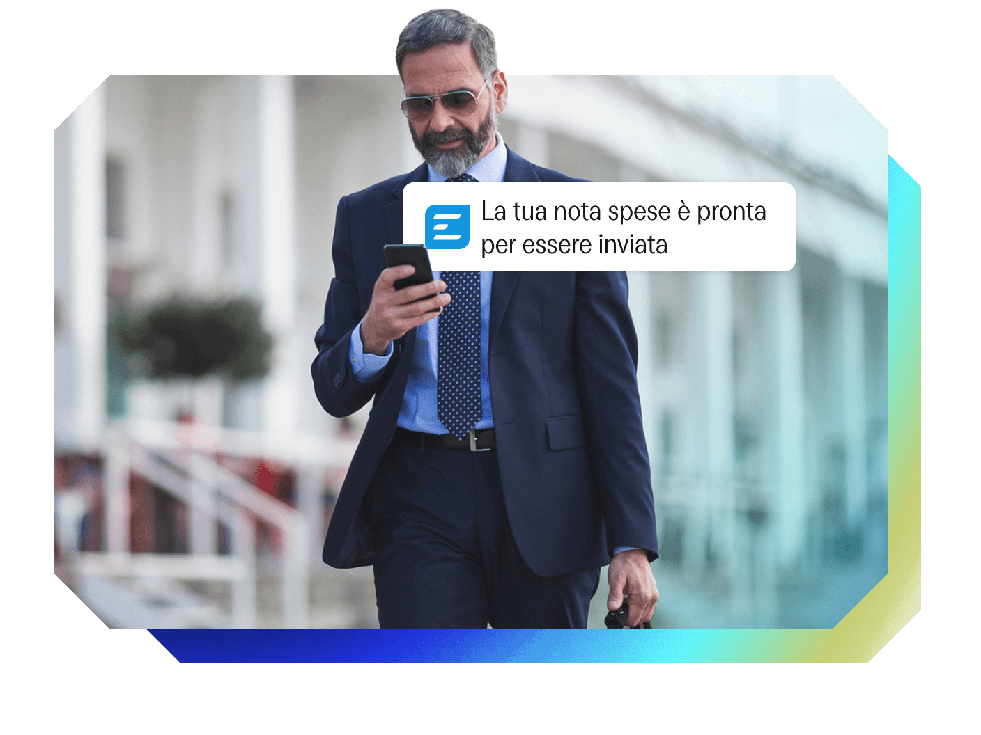 Man in a suit checking his phone, displaying an "expense report ready" notification.