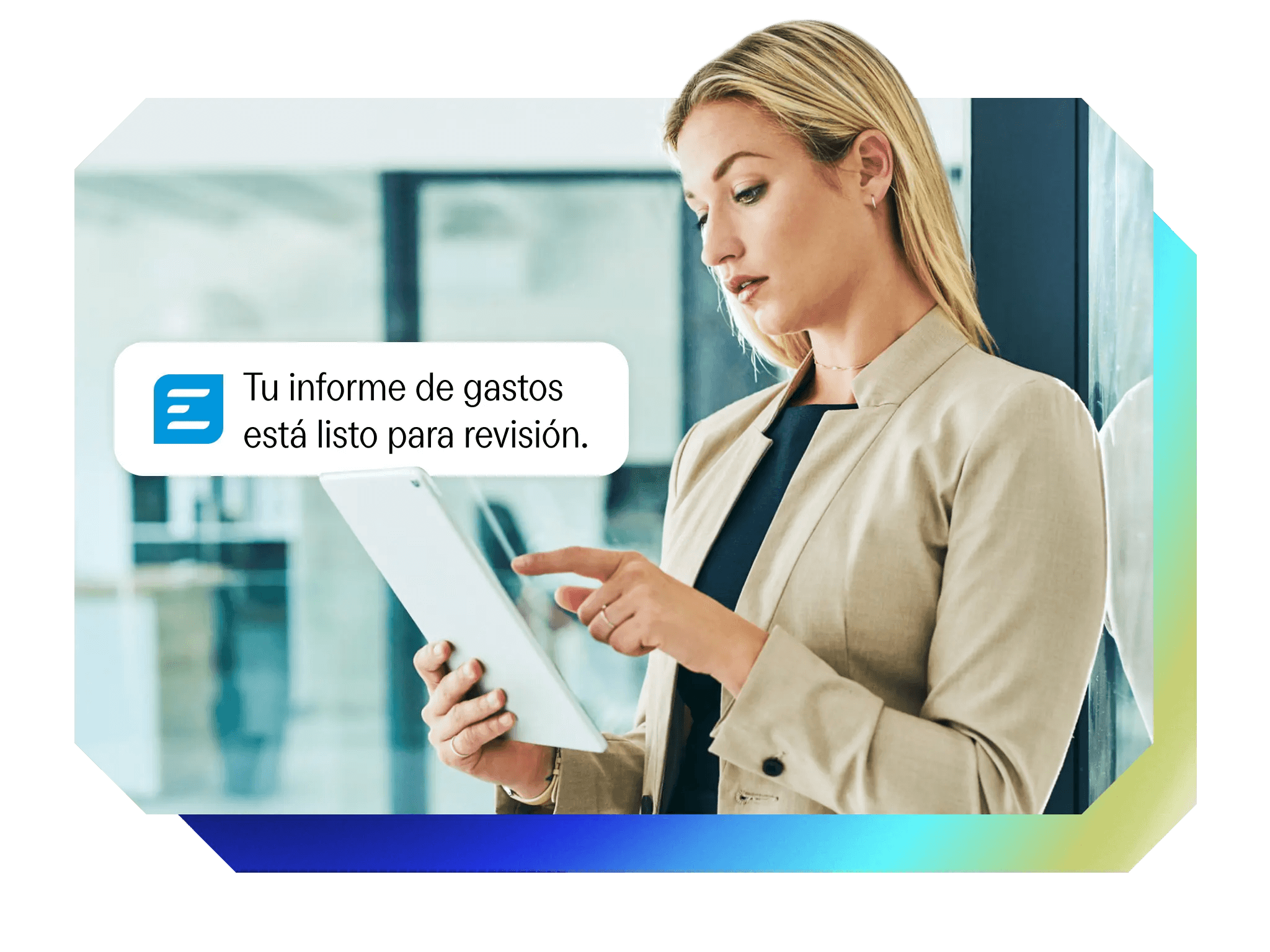 a woman is smiling while using a tablet computer .