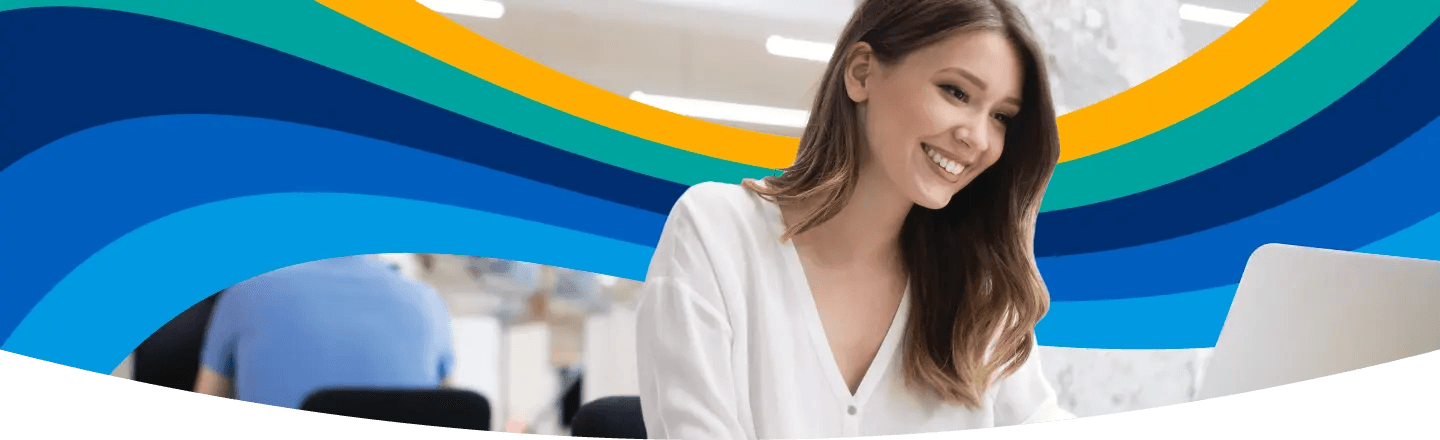 A smiling young woman looking at a laptop with colorful wavy bands in the background.