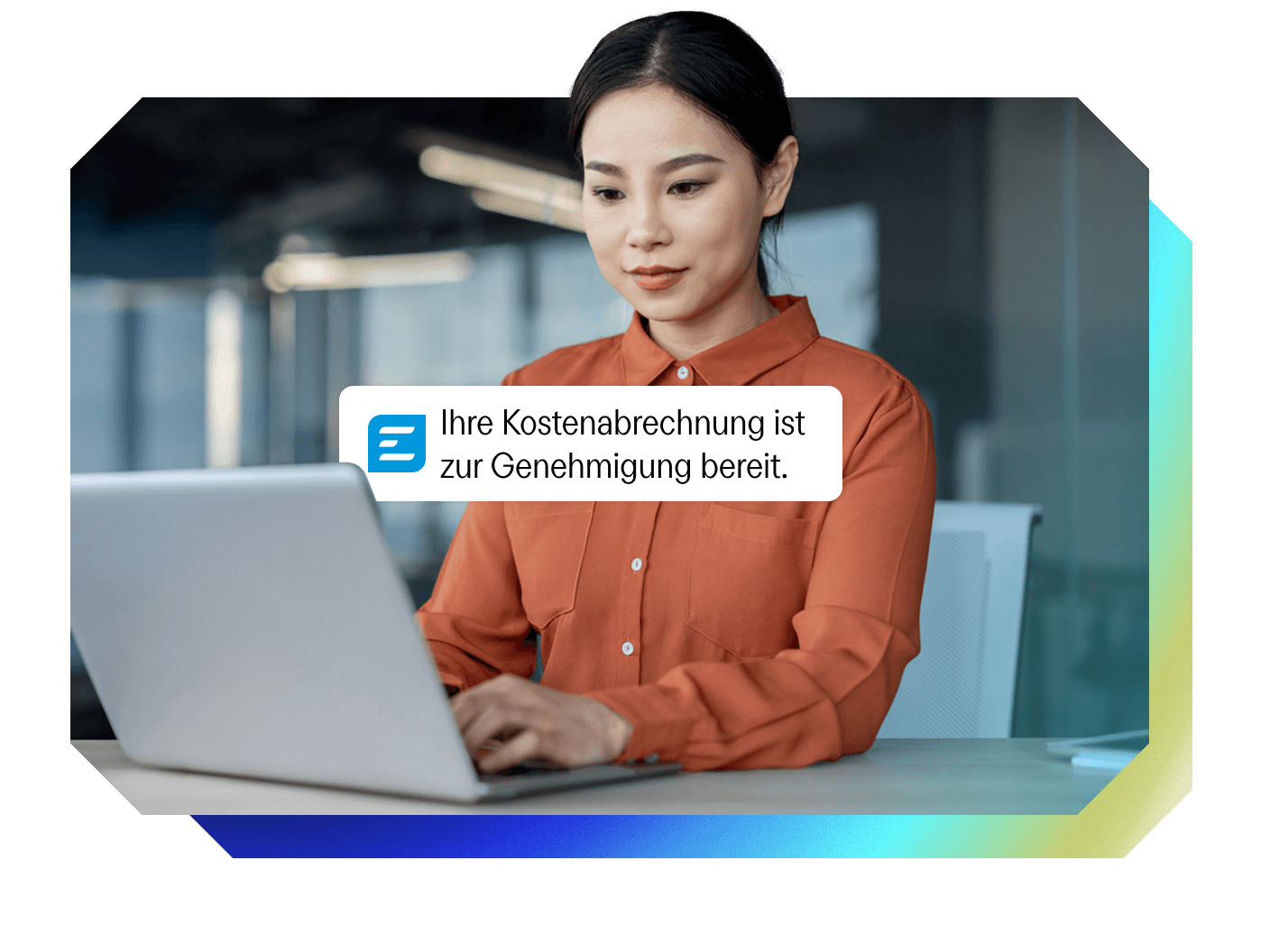 Woman working on a laptop with a notification stating "Your expense report is ready for approval."