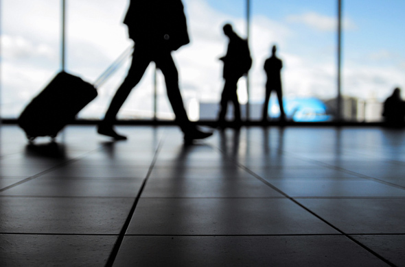 Business traveler walking through an airport